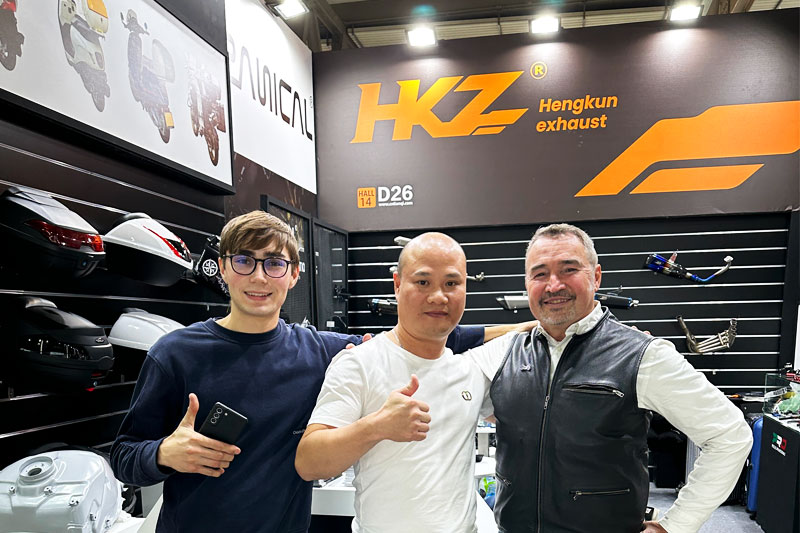 Visitors at the PANICAL exhibition booth during the 2023 Milan Motorcycle Show
