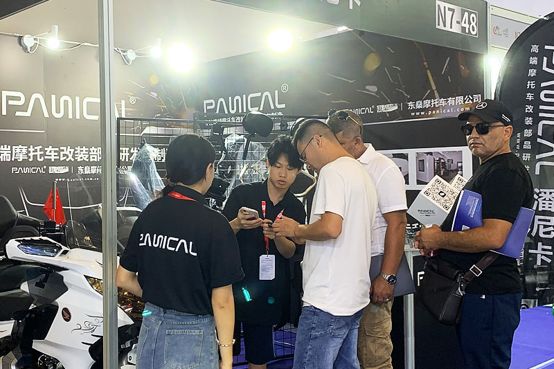 PANICAL team assisting visitors at the 2024 Chongqing Motorcycle Expo