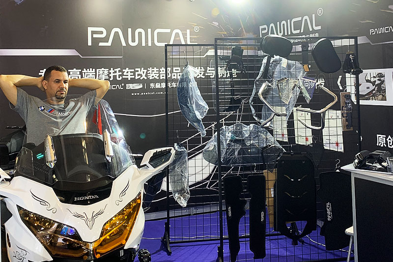 Touring motorcycle and PANICAL accessory display at the 2024 Chongqing Motorcycle Expo