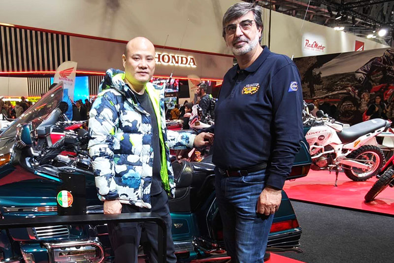 Touring motorcycles and visitors at the 2024 Milan Motorcycle Show in Italy
