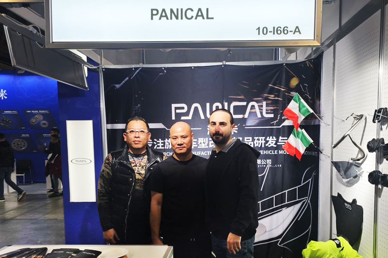 Visitors at the PANICAL booth during the 2024 Milan Motorcycle Show