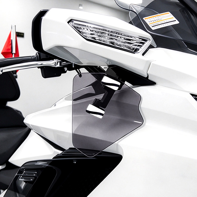 PANICAL Gold Wing GL1800 F6B gray PMMA long hand wind deflectors with subtle purple tint and chrome hardware installed below rearview mirror